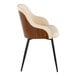 A modern armchair with a walnut wood back, cream faux leather upholstery, and black metal legs.