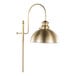A gold metal floor lamp with a dome-shaped shade and an arched design.