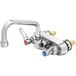 A chrome T&S wall mount faucet with two handles and a lever.