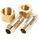 Close-up of three brass threaded nuts and tailpieces.