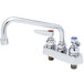 A T&S chrome deck mount faucet with two handles and a blue handle.