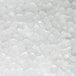 A close-up view of clear nugget ice produced by a commercial ice machine.