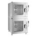A double-stacked, stainless steel, full size electric combi oven with manual controls and glass doors.