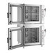 A double-stacked, stainless steel electric combi oven with manual controls and glass doors, designed to hold six full-size pans in each unit.
