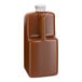 A 64 fl. oz. plastic bottle of Capora Salted Caramel Flavoring Sauce with a white cap.