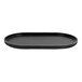 An oval-shaped black resin amenity tray.