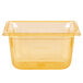 A clear plastic Vollrath food pan with a yellow lid.