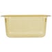 A Vollrath 1/3 size amber plastic food pan with a lid.