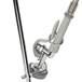 A T&S metal pre-rinse unit pole with a handle and clamp.