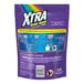 A bag of XTRA Sure Shot Tropical Passion powder laundry detergent paks containing 34 paks.