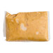 A vacuum-sealed package of Naughty Chile Taqueria Queso Hatch Green Chile Sauce.