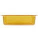 A Vollrath amber high heat plastic rectangular food pan.