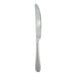 A stainless steel heavy weight dinner knife with a textured handle.