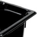 A black plastic Vollrath food pan with a lid.