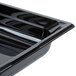 A close up of a black Vollrath plastic food pan.