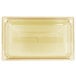 A Vollrath amber plastic food pan with a red stripe.