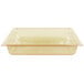 A yellow rectangular Vollrath plastic food pan with lid.