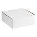A plain white, square bakery box with a closed lid, suitable for cakes or pastries.