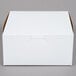A plain white, rectangular bakery box with a closed lid, suitable for pies or baked goods.