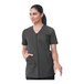 A women's steel gray full-zip housekeeping tunic with short sleeves and front pockets.