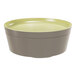 A round green melamine plate or bento box lid.