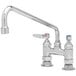 A silver T&S deck-mount faucet with two blue and red knobs.
