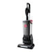 A cordless upright vacuum cleaner with cleaning tools and a 40V battery.