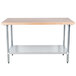 A wood top Advance Tabco work table with a galvanized base and shelf.