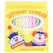 A box of 36 multi-colored birthday candles in a yellow package featuring cartoon clowns.