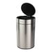 A stainless steel round wastebasket with an automatic lid.