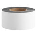 A roll of 3-inch wide white magnetic write-on label tape.