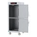 A Metro C5 heated holding cabinet with solid Dutch doors open.
