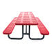 A red perforated metal picnic table with attached benches and black metal legs.