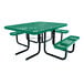 A green square expanded metal picnic table with attached benches and black metal legs.