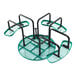 A green round expanded metal merry-go-round with black handrails and four seats.