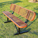 A 6-foot brown expanded metal bench with a backrest, designed for outdoor use.
