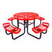 A round red expanded metal picnic table with four attached curved benches and black metal legs.