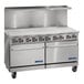 A large stainless steel electric range with ten control knobs, two oven doors, and a backsplash, designed for commercial kitchens.