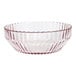 A round pink glass cereal bowl with a textured, ribbed design.