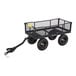A black steel utility cart with mesh sides, four large wheels, and a pull handle.