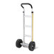 A silver aluminum hand truck with black handles and two large black wheels.