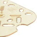 A close up of a Vollrath amber plastic drain tray with holes.