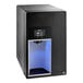 A black countertop ice maker and water dispenser with a digital display and illuminated dispensing area.