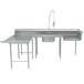 A stainless steel U shape soil dishtable with a sink and faucet on the left side.