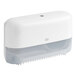 A white Tork Elevation OptiServe coreless high-capacity double roll toilet tissue dispenser.