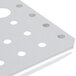 A stainless steel Vollrath false bottom with holes.