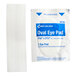 An individually packaged sterile oval eye pad with adhesive strips for first aid use.