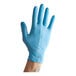 A blue nitrile powder-free exam glove worn on a hand.