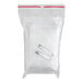 A clear plastic bag containing a non-woven cotton triangular bandage and two safety pins.