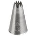 A metal open star piping tip used for cake and pastry decorating.